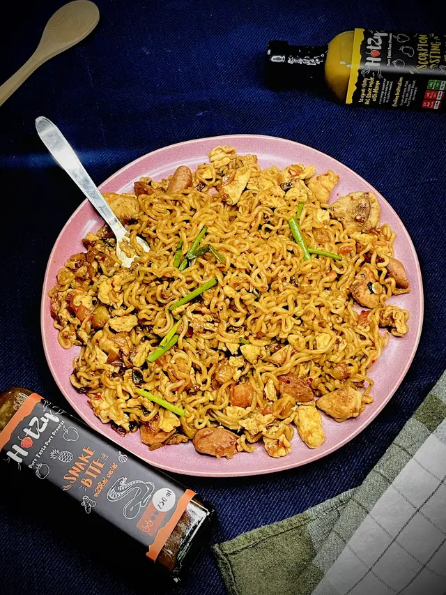 Ready to ditch the bland and turn your noodle game into a Sri Lankan spice fiesta? 🇱🇰 Introducing Hotzy, your new BFF for next-level noodle adventures! Forget boring takeout, we're talking homemade magic with a fiery twist. Our all-natural Hotzy sauces, crafted with fresh Scotch bonnet peppers and secret Ceylon spices, explode with flavor, not additives. ️ Mango madness or pineapple punch? Choose your weapon (Scopion Sting or Snake Bite) and transform your noodles from meh to BAM! in seconds! Dip, drizzle, or drench - Hotzy adds pure taste, pure heat, pure promise. So ditch the bland, embrace the hot, and Hotzy your noodles tonight! Share your fiery creations with #HotzyNoodles and join the Sri Lankan spice revolution! ️ Ready to unleash the noodle beast? Hit that follow button and let's get cookin'!  P.S. Hotzy - the secret weapon in your kitchen. Don't be shy, grab some today! #hotzy #spicyfood #hotsauce #FoodTok #Foodie #naimiris🌶 #ordernow🛍️🛒 #online #sauce #fyp #chilisauce 