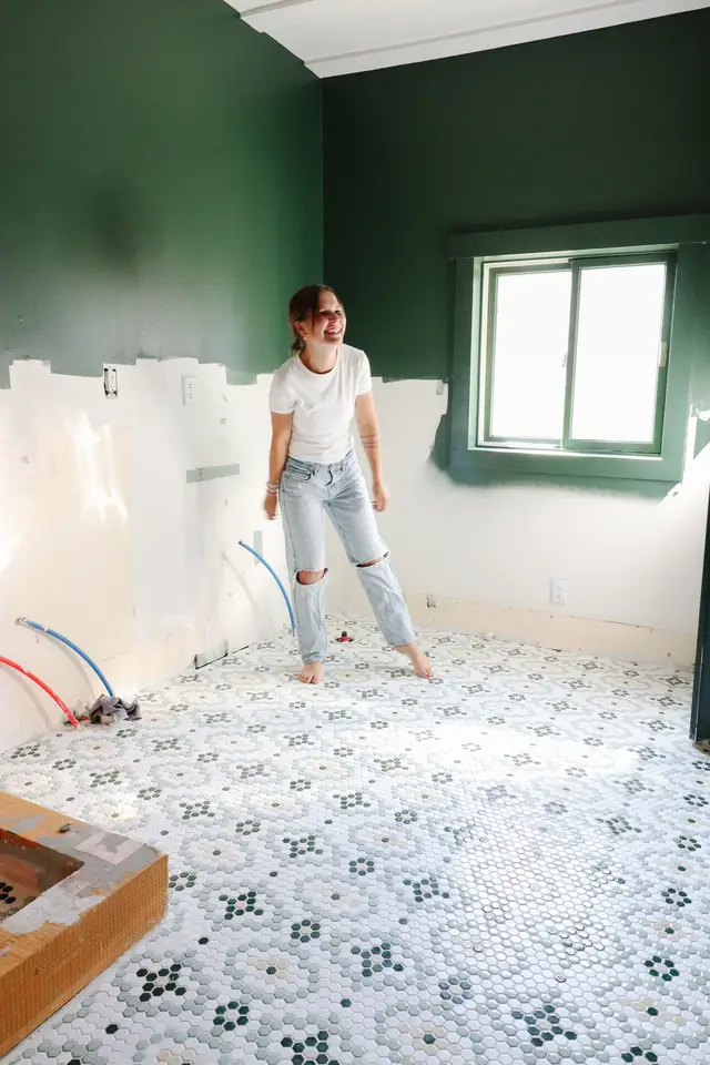Day 54. Laughing cause it turned out pretty good. 🥹😂  I did all of the grouting off camera because I was stressed and it was like midnight and I was over this shit. But the good news is, I’m done…..with that part 😬🤣 This entire project has been the hardest thing I’ve ever done. I’ve never tackled something like this, let alone ALONE. I’ve learned I rush sometimes, I make mistakes more often than I’d like to admit, I’m not a perfectionist, I can do hard things, 2 hours isn’t near enough time, things take longer than you think, and so much more. I truly did not intend this renovation to take 7 months +. But the reality of my situation is my kids come first and there is no rush on this. Besides me being impatient. Haha. So thanks for hanging in there with me. We’re getting close.  #mosaictile #laundryrenovation #bathroomrenovation #bathroominspo #laundryinspo 