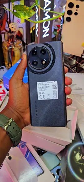 TECNO CAMON 30s 6GB +128GB ksh 24,000 Tecno Camon 30S Key Features RAM: 6GB/8GB Internal Memory: 128GB/256GB Display: 6.78-inches, AMOLED, 120 Hz Processor: Mediatek Helio G100 (6 nm) OS: Android 14 with HiOS 14 Main Camera: 50MP+2MP Selfie Camera: 13MP Connectivity: 4G Battery: 5,000mAh, 30W ●Reserve  Paybill:247247 Ac no : 340495 ● The device  features a 6.78-inch AMOLED display, boasting 1080 x 2436 pixels (~393 ppi density) and 120Hz refresh rate. The phone runs on Android 14, and HIOS 14 and is powered by an Octa-core Mediatek Helio G100 (6 nm) processor, anchored by 128GB 6GB RAM, 128GB 8GB RAM, or 256GB 8GB RAM. At the rear end, it holds a 50MP primary camera + 2MP+ Auxiliary Lens.  A 13 MP front camera enables capturing quality selfies and 1080p video recordings. Connectivity is wireless via Bluetooth, Wi-Fi, GPS, Infrared, and NFC. The 4G network-enabled phone supports FM Radio but no 3.5mm jack port for wired connectivity. A USB Type-C provided wired connectivity, allowing for fast charging and data transfer. Powering it is a 5,000mAh battery. ●CONTACT ☎️: 0746618285 for more information to order or directions to our store.  we are located at New Alnoor exbitions shop no B3  first floor Accra road taveta lane opposite embasava stage  THANK YOU FOR CHOOSING US ✅️ 🛒  #tecnocamon #tecno #camon30 #onlineshoping #viral #4G #fypシ #happyshoping🥰🥰🛍️🛒 #shoping #unboxing #juganhub_technologies #black #kenyanoriginal #black #foryoupage #foryou #unboxing #tiktok #amazingdiscounts #happyshoping #happyshoping #amazingdiscounts #happyshoping🥰🥰🛍️🛒 #4G #fypシ 