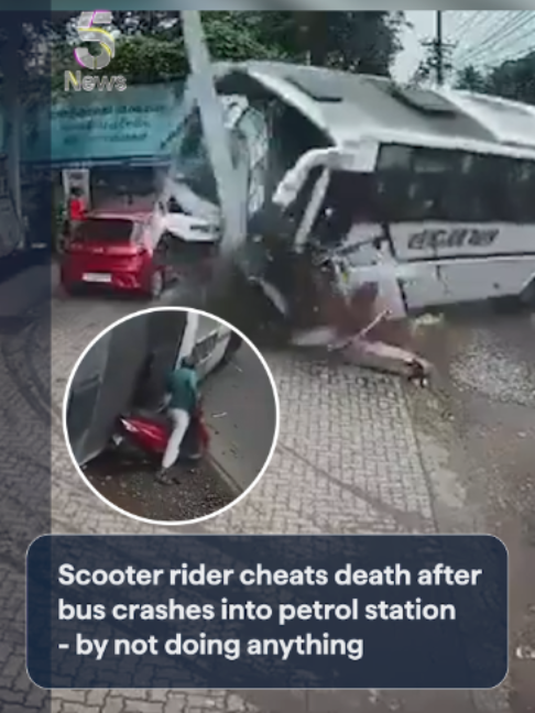 A scooter rider escaped unhurt after a tourist bus crashed and rolled over, narrowly missing him, in India. The incident unfolded in Kakkoor, Kerala, on August 27 after a tourist bus carrying around 35 members of a wedding party overturned after crashing into a petrol pump on the Koothattukulam-Piravom Road about 10.25am. According to police, the bus was travelling from Piravom to Elanji when the driver allegedly swerved to the right to avoid a two-wheeler that turned without indicating. Although he applied the brakes, the driver lost control of the bus which overturned near the fuel dispensing area. Around 20 passengers sustained injuries and were taken to three private hospitals in Koothattukulam. Police said none of the injuries appeared to be serious.