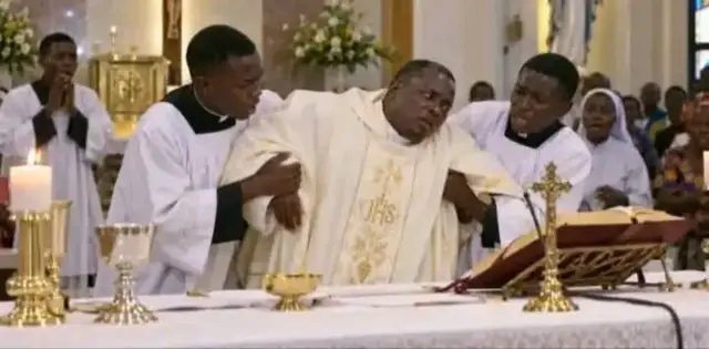 FATHER CHARLES: THE MASS THAT ALMOST ENDED IN TEARS It was a beautiful Sunday morning. The church was filled with the faithful. The choir was singing, the altar was beautifully prepared, and Father Charles stood at the altar, ready to celebrate Holy Mass. No one knew what was about to happen. Father Charles had been feeling weak since morning, but he refused to complain. He looked at the congregation and smiled. “This Mass must go on,” he whispered to himself. The Mass began. Everything was peaceful until the moment of the Eucharistic Prayer. Father Charles lifted his hands toward the altar, but suddenly, his body began to shake. At first, people thought he was simply weak. Then the shaking became severe. His hands trembled. His body convulsed, and he struggled to remain standing. The congregation became silent. Some people began to cry. Before Father Charles could fall, the seminarian standing nearby quickly rushed to him and held him firmly. “Father! Father, please hold on!” The Mass servers immediately moved closer. One helped support him while another called for assistance. The church that had been filled with singing was now filled with fear and tears. “Jesus, please save our priest!” “Lord, have mercy!” People began praying the Hail Mary and the Our Father. Father Charles could barely speak. But with all the strength he had left, he whispered: “Don't be afraid... Jesus is here.” Those words broke the hearts of everyone present. The priest who had spent years praying for others was now the one who needed prayers. He was carefully taken away from the altar and given immediate attention. Some people thought the Mass was over. Some were already crying. But the seminarian looked toward the altar and said: “We cannot give up. We must pray.” The entire church united in prayer. Rosaries were raised. Hands were lifted. Tears flowed. And the name of Jesus filled the church. “Jesus, Son of David, have mercy on your servant!” Minutes felt like hours. Then something unexpected happened. Father Charles slowly opened his eyes. The people became silent. He looked around and asked: “Where is the Blessed Sacrament?” The people began to cry again—but this time, they were tears of joy. The priest slowly regained his strength. After receiving medical attention and resting, Father Charles insisted on returning to the church—not to prove his strength, but to remind everyone that God had not abandoned them. He stood before the congregation. His voice was weak, but his faith was strong. He said: “Today, I learned something again: sometimes the people we think are strong also need someone to hold them. And sometimes, when we cannot hold ourselves, God sends someone to hold us.” He looked at the seminarian who had caught him. “Thank you for not allowing me to fall.” Then he looked at the congregation. “Thank you for praying.” He paused. And with tears in his eyes, he said: “The devil may have tried to interrupt the Mass, but he did not win. God has the final word.” The congregation erupted in applause. Father Charles raised his hand and gave the blessing. That day, the Mass did not end in tragedy. It ended in victory. Because sometimes victory does not mean that we never fall. Victory means that when we fall, God gives us people who will hold us, prayers that will strengthen us, and grace that will help us rise again. And Father Charles' story became a testimony: “I almost fell at the altar, but God's grace held me.” The battle was frightening. The tears were real. The pain was heavy. But in the end, God had the final victory.#fpy #catholictiktok #tiktok #foryou 