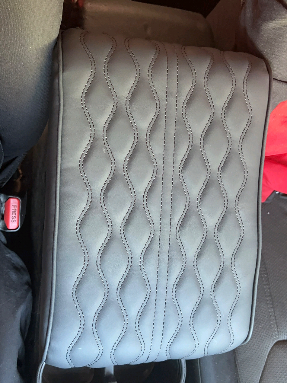 Armest cushions for thoes who loved the look but dont want any cupholders #armrest #armrestcushion #carsoftiktok #comfort #caraccessories 