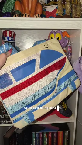 🚝✨ Day 3 of rhinestoning my Disney Monorail tote bag! Slowly but surely, this bag is getting its sparkle makeover! 💎✨ Every rhinestone is bringing us one step closer to the finished product, and I cannot WAIT to see it all come together! 🤩 What Disney-themed project should I rhinestone next?! 👀💖 #DisneyDIY #Rhinestoning #DisneyCrafts #DisneyMonorail #RhinestoneArt