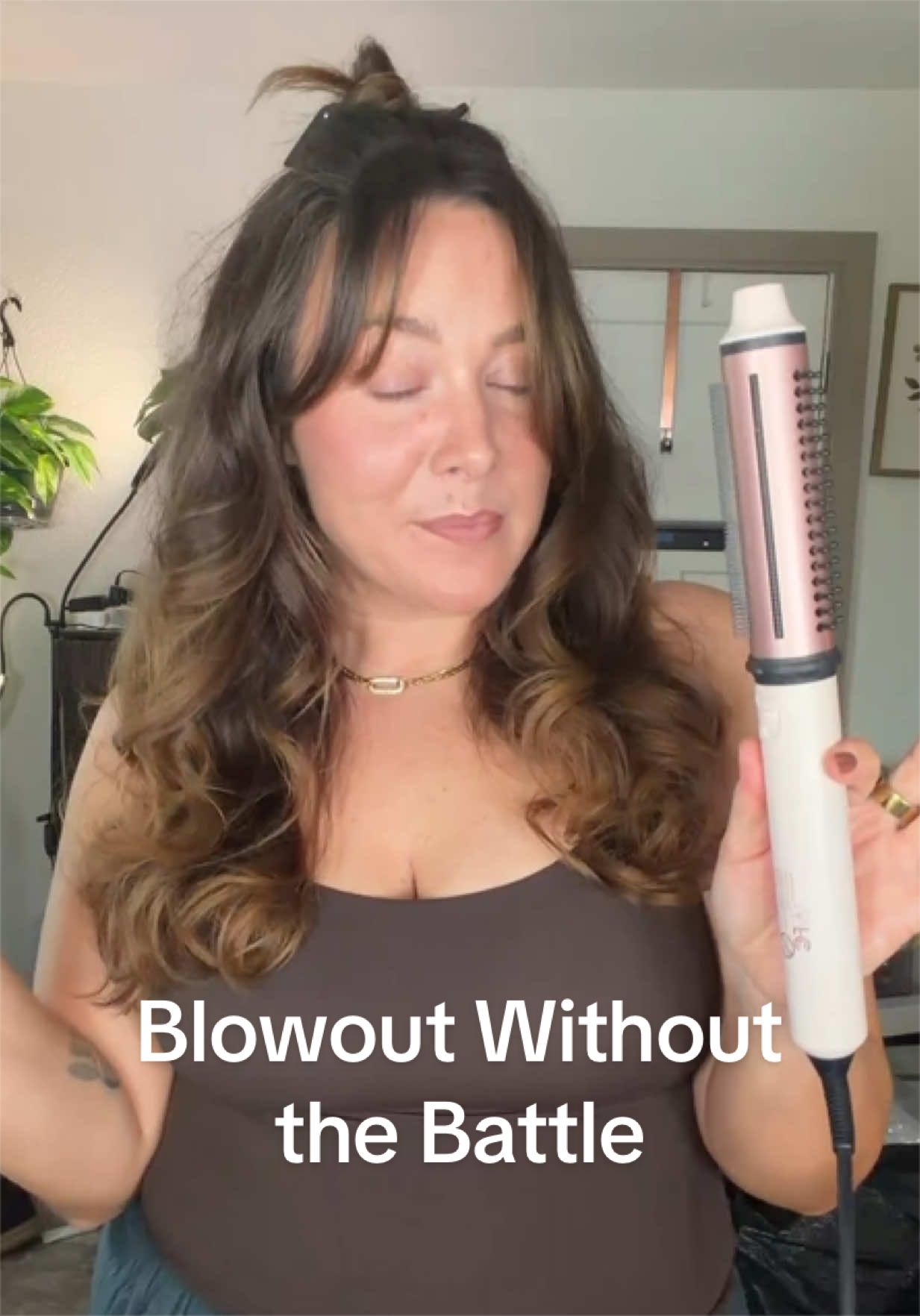 Getting those bouncy blowout curls at home is one thing, but getting a round brush OUT of your hair without a fight? That’s another story. 😂 The @FHI Heat SwiftStyler is a 2-in-1 heated styling brush and curling wand with retractable bristles, a ceramic tourmaline barrel, and adjustable heat for soft waves, root volume, and smooth, bouncy ends. As a hairstylist, I love the idea of having the grip of a round brush and being able to release the hair with one little switch. Such a clever feature for an at-home blowout tool! #FHIHeat #SwiftStyler #HeatedRoundBrush #BlowoutHair #HairStylingTools Affiliate link. I may earn a commission. 