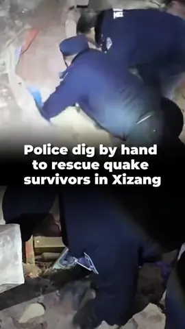 Police dug through rubble to rescue residents after a 7.0-magnitude earthquake struck a county in southwest China's Xizang on Thursday. The officers worked by hand overnight amid freezing temperatures and repeated aftershocks. #Earthquake #Rescue #Xizang #China 