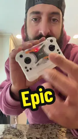 A drone that fits INSIDE its own remote?! 🤯🚁 This little thing is seriously awesome! Super compact, easy to take anywhere, and so much fun to fly. The fact that you can store the entire drone right inside the controller is such a cool design! #MiniDrone #RCDrone #DroneTok #CoolGadgets #TikTokShop