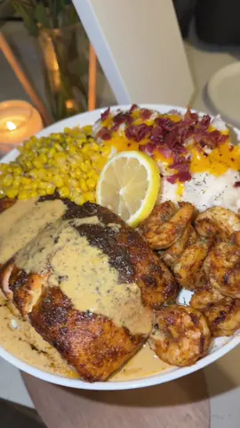 Cajun salmon & shrimp paired with loaded mash & corn, topped with a creamy Cajun sauce #cajunsalmon #dinner #linabeancuisine #food #alinacbrown 