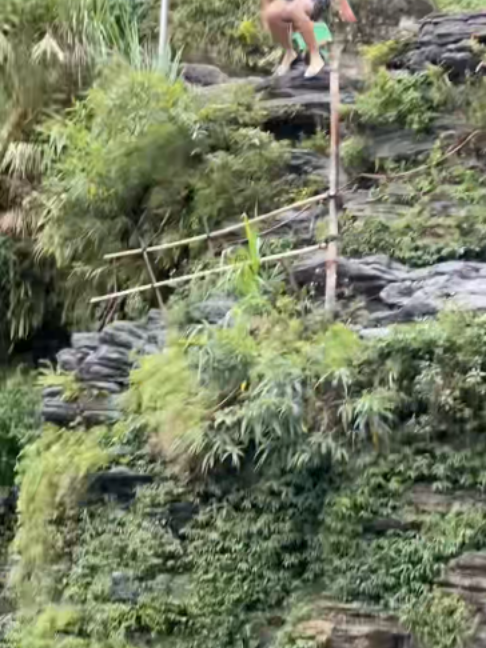 Standing at the edge, deep breath, and then the jump. Waterfall cliff jumping in Vietnam's Ha Giang is all about nerves and a little courage. Would you dare to jump? 🌊 #waterfall  #travel  #cliffjumping  #adventure  #nature  #hagiang  #Outdoors  #jump