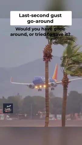 A last-second gust sends this Southwest 737-700 around at Las Vegas. Palms thrashing as it powers up right over the camera #aviation #goaround #southwestairlines #planespotting #lasvegas